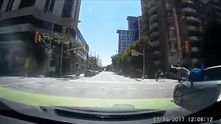 Cyclist Hit By Car After Running Red Light