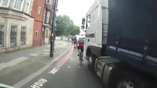 Cyclist Nearly Crushed To Death By Truck While Crossing Busy Intersection