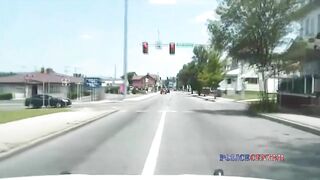 Dashcam Footage Shows A Police Car Flipping Over After A Collision