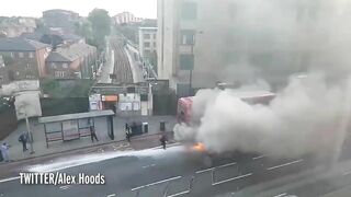 Dramatic Footage Shows A Burning London Bus