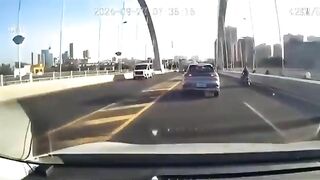 Driver Changes Lanes And Crashes