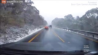 Driver Crashes While Overtaking In Snowfall - Video