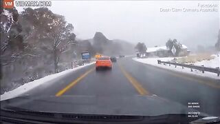 Driver Crashes While Overtaking In Snowfall - Video