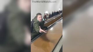 Drunk Russian Stops Escalator