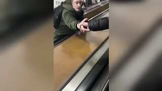 Drunk Russian Stops Escalator