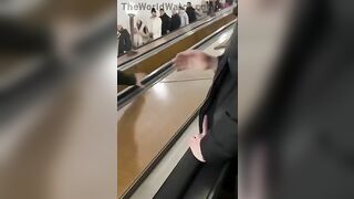 Drunk Russian Stops Escalator