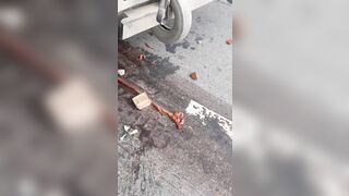 Man Splashed Under Truck