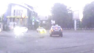 Ambulance Nearly Flips Over After T-bone Accident