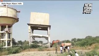 A Falling Water Tank Crushed A Man By Nearly An Inch