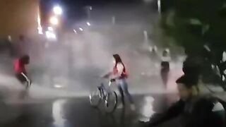 Protesters Defend Themselves With Water Cannons