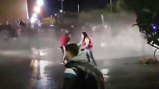 Protesters Defend Themselves With Water Cannons