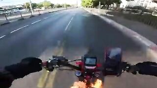 Man Catches Fire While Riding Bicycle