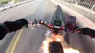 Man Catches Fire While Riding Bicycle