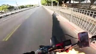 Man Catches Fire While Riding Bicycle