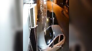 Homeless Man Crossing The Street With All His Belongings