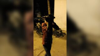 Idiot Uses Fuse To Light Firecrackers And Holds Firecrackers