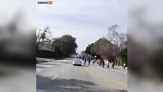 Man Drives Mercedes Through Crowd Of Punks Blocking Street