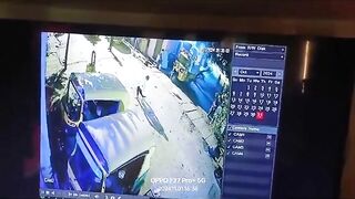 Man Sitting On A Box Of Burning Fireworks