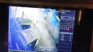 Man Sitting On A Box Of Burning Fireworks