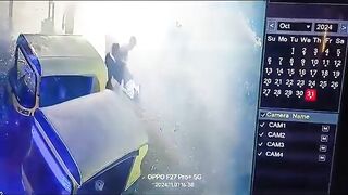 Man Sitting On A Box Of Burning Fireworks