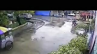 Girl Involved In Funny Two-wheeler Accident - Video - VidMax Co