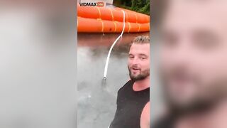 Homeowner Places Giant Flotation Devices Around His House To Prevent Flooding