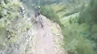 Horrifying Moment Cyclist Loses Balance And Falls Off Cliff