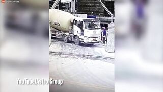 Horror: Concrete Mixer Plunges Into Huge Hole With Driver