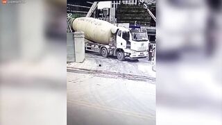 Horror: Concrete Mixer Plunges Into Huge Hole With Driver