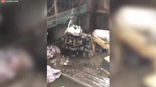 Horror: Concrete Mixer Plunges Into Huge Hole With Driver