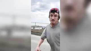 An Angry Man Tries To Break A Window And Walk Away