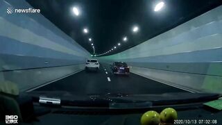 Car Hits Tunnel Wall When Overtaking Suddenly