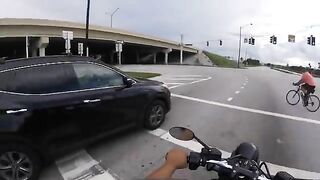Bicyclists Gain Karma Immediately After Running A Red Light