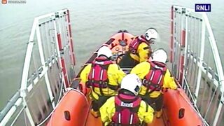 Lifeboat Crew Rescues Woman Who Can't Swim From Rooftop
