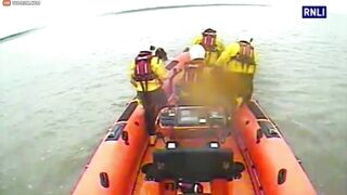 Lifeboat Crew Rescues Woman Who Can't Swim From Rooftop