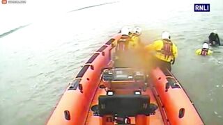 Lifeboat Crew Rescues Woman Who Can't Swim From Rooftop