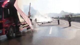 Truck Catches Fire After Colliding With Parked Vehicle