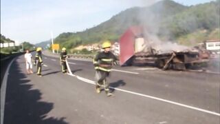 Truck Catches Fire After Colliding With Parked Vehicle