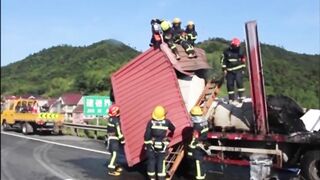 Truck Catches Fire After Colliding With Parked Vehicle
