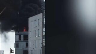 Man Escapes Burning Building By Grabbing Crane Hook