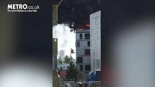 Man Escapes Burning Building By Grabbing Crane Hook
