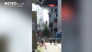 Man Escapes Burning Building By Grabbing Crane Hook