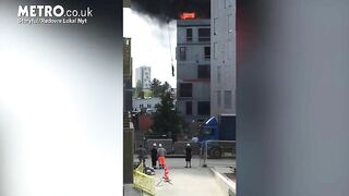 Man Escapes Burning Building By Grabbing Crane Hook