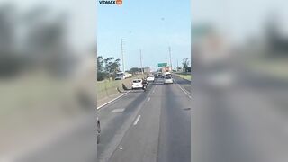 Man On Motorcycle Gets Angry At Car And Drives Erratically