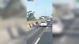 Man On Motorcycle Gets Angry At Car And Drives Erratically
