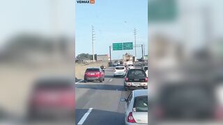 Man On Motorcycle Gets Angry At Car And Drives Erratically