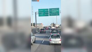 Man On Motorcycle Gets Angry At Car And Drives Erratically
