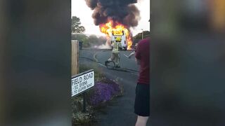 Minibus Burns On Quiet Street
