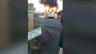 Minibus Burns On Quiet Street