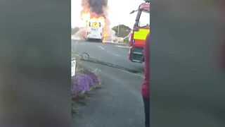 Minibus Burns On Quiet Street